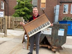 man holding instrument